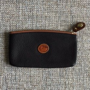 Dooney & Bourke black zippered clutch.